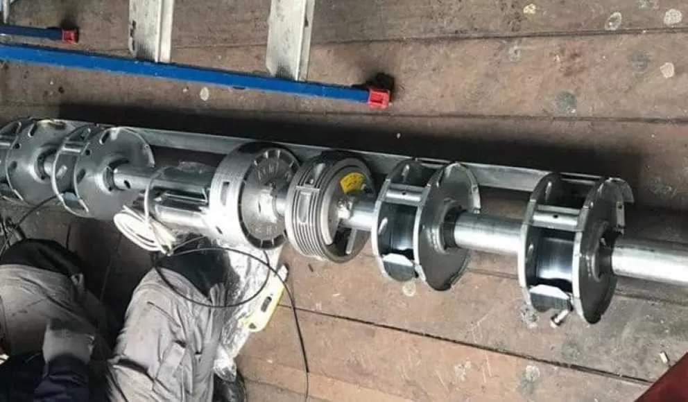Changement axe motorisé rideau métallique Avon 77210