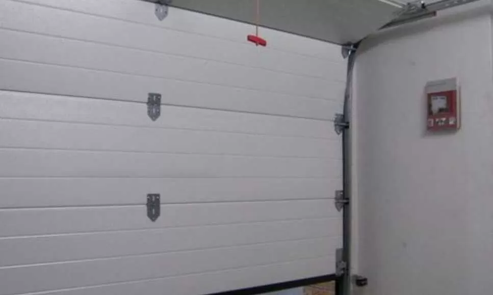 réparation porte sectionnelle Neuilly Plaisance