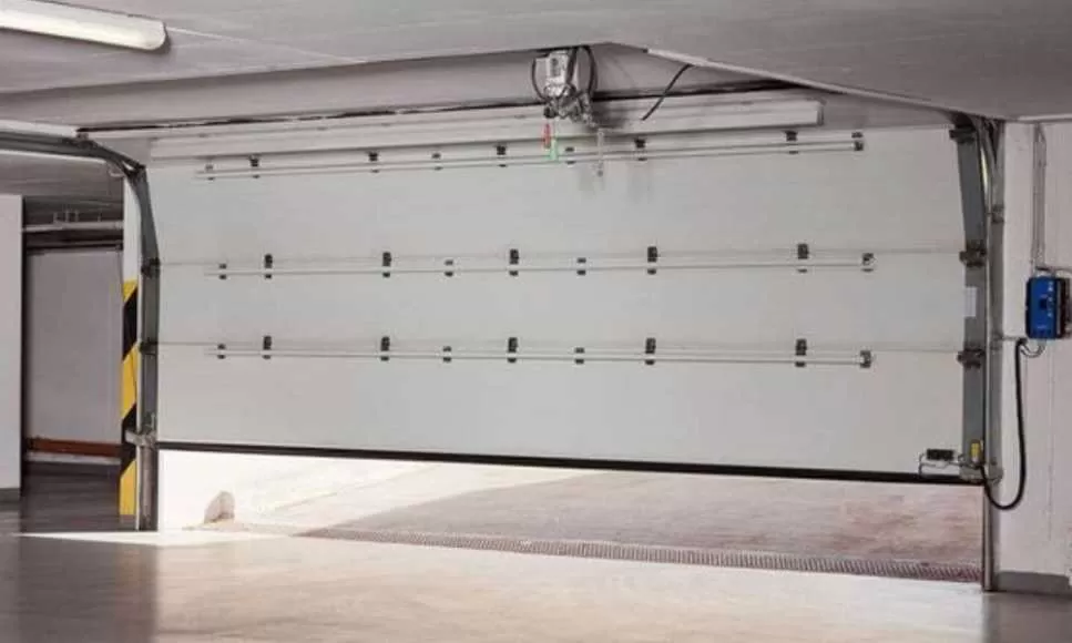 réparation porte sectionnelle Chars