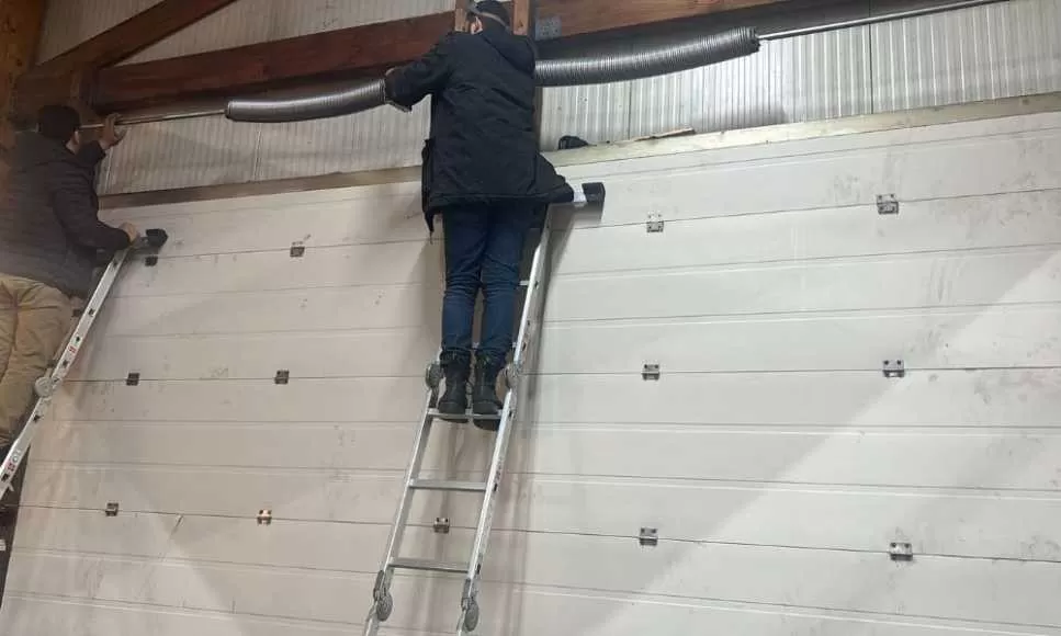 réparation porte sectionnelle Deuil la Barre