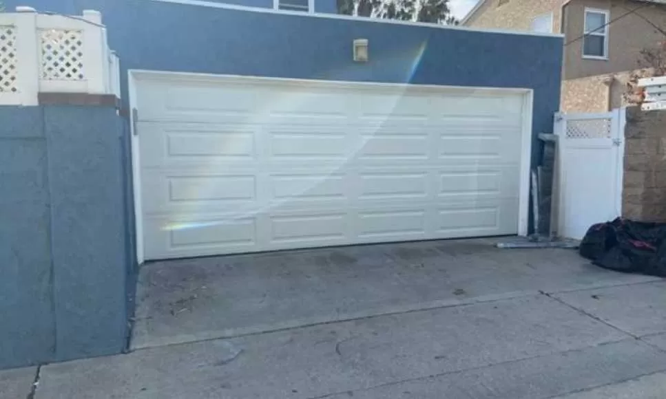 réparation porte sectionnelle Garges lès Gonesse