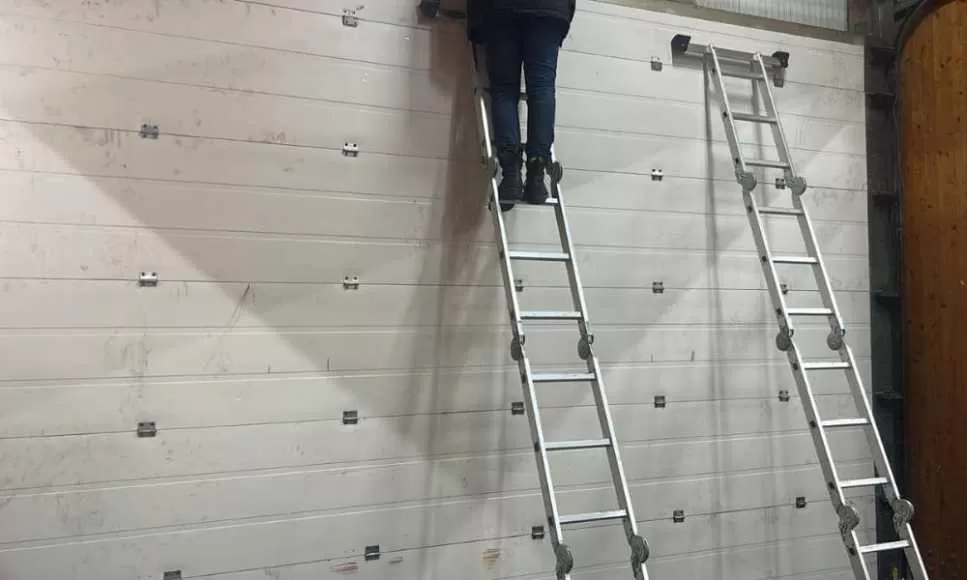 réparation porte sectionnelle Sagy
