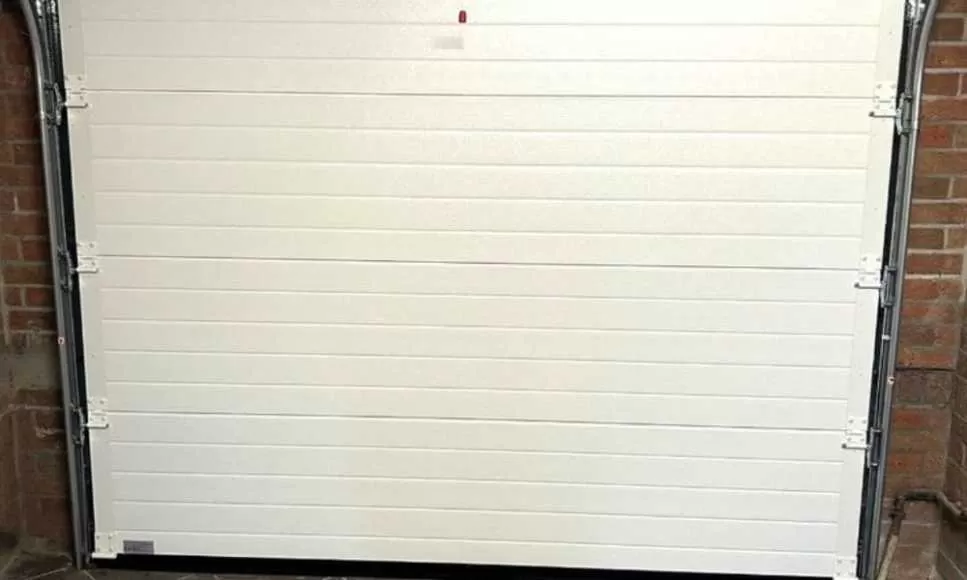réparation porte sectionnelle Le Mée sur Seine