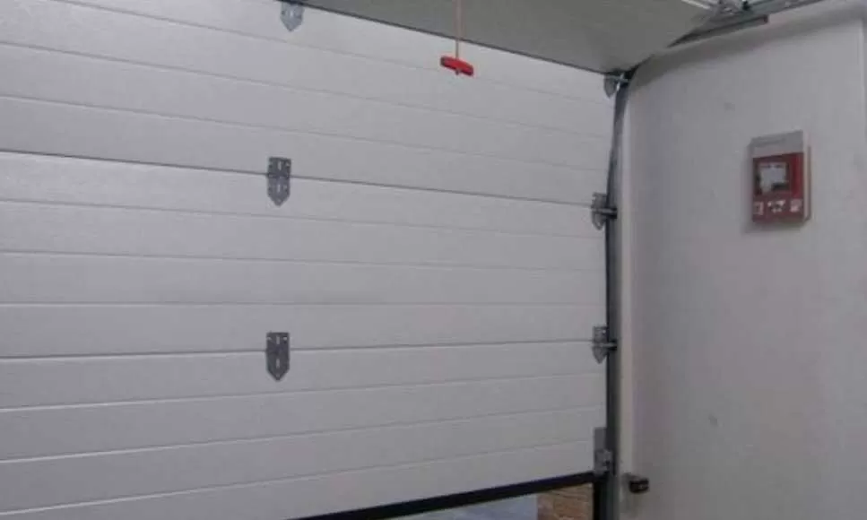 réparation porte sectionnelle Villeparisis