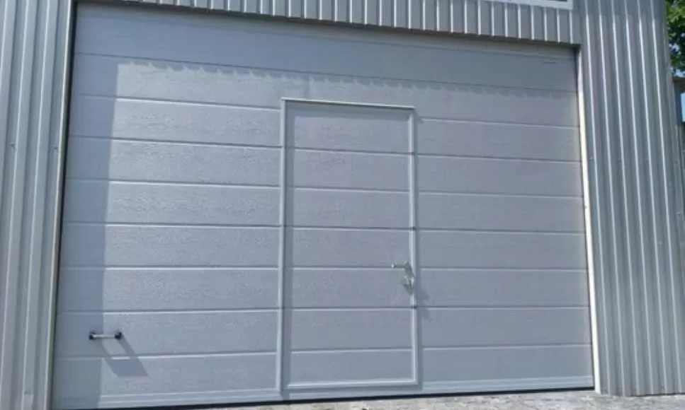 Réparation porte sectionnelle La Verrière