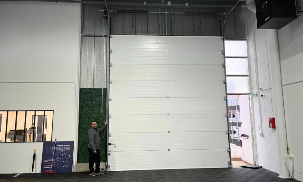 Réparation porte sectionnelle Épiais Rhus