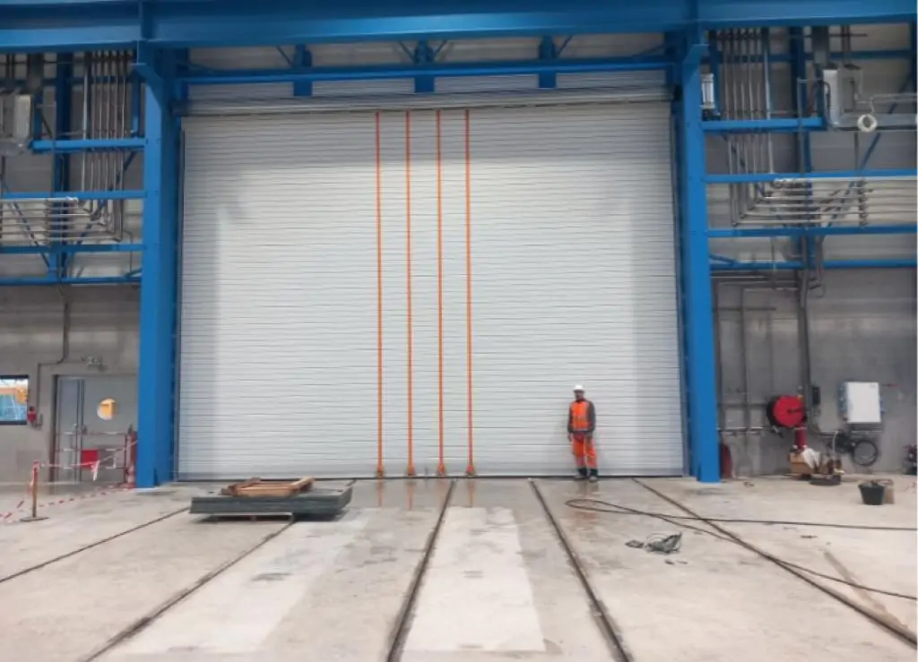 Installation rideau metallique