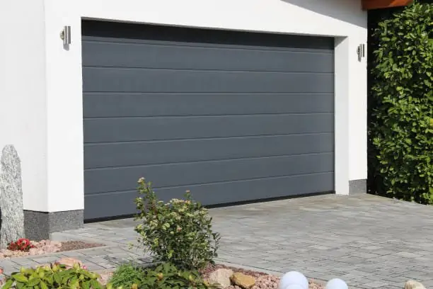 reparation porte garage sectionnelle