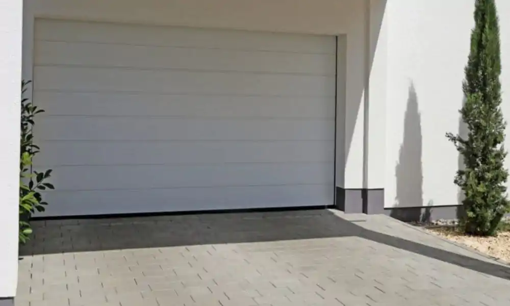 Comment ouvrir une porte de garage bloquée