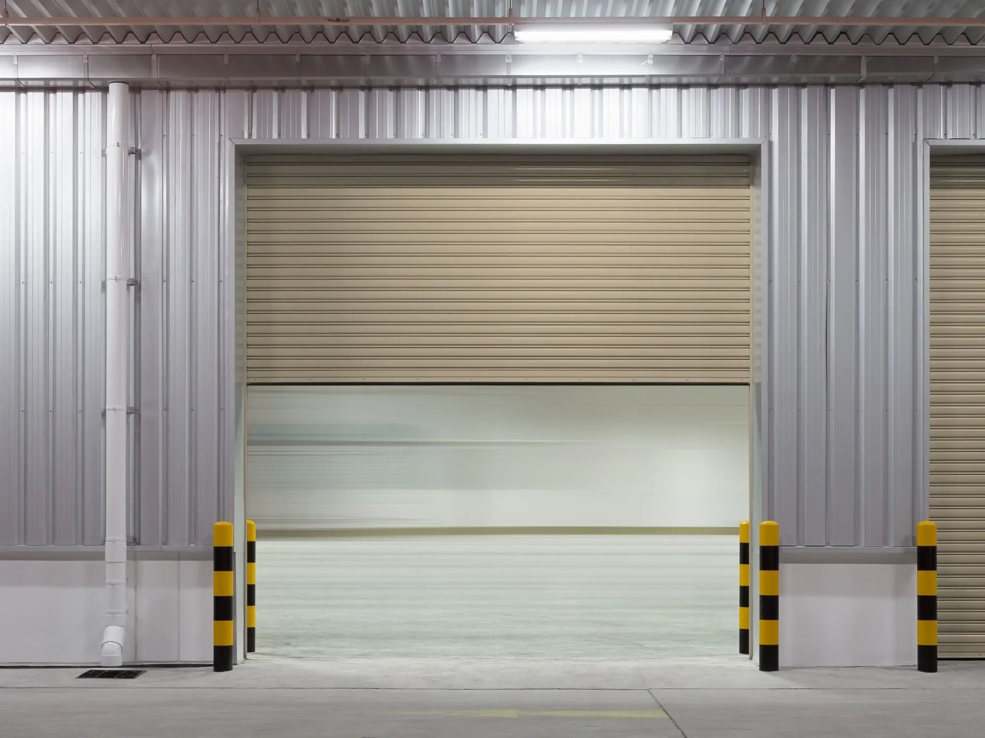repartaion porte de garage sectionnelle La courneuve