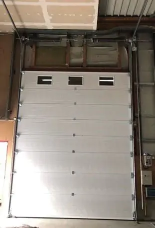 réparation porte sectionnelle Palaiseau