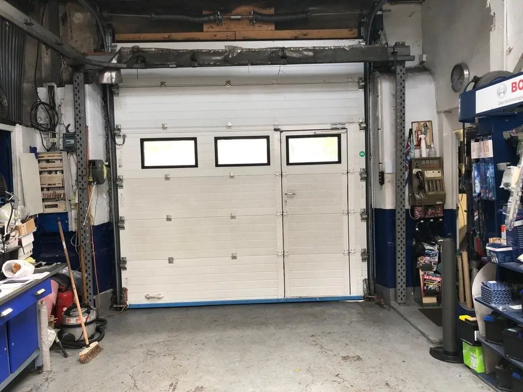 reparation porte garage sectionnelle Bourg la Reine
