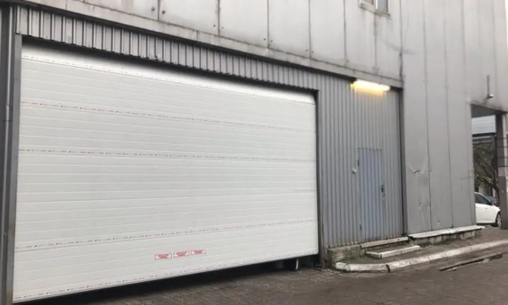 Réparation porte sectionnelle Épinay sur Orge