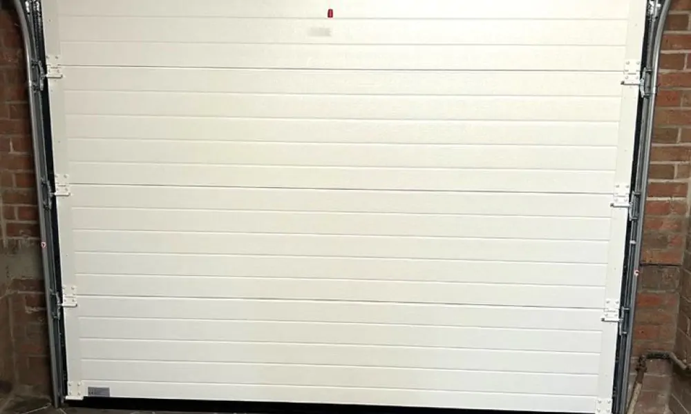 Réparation porte sectionnelle chauconin-neufmontiers