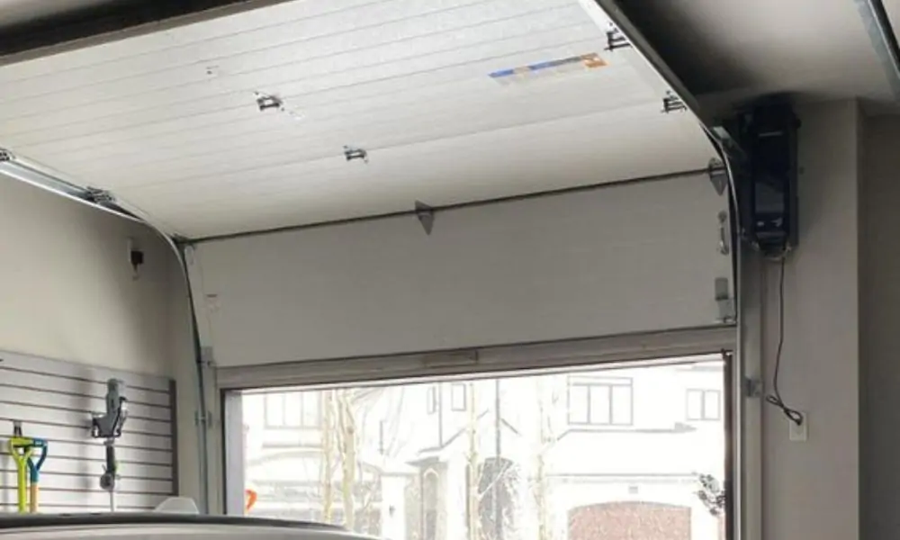 réparation porte sectionnelle Verneuil sur Seine