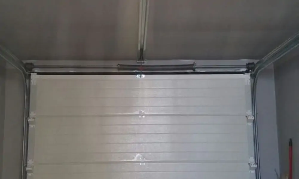 Réparation porte sectionnelle Vaux sur Seine