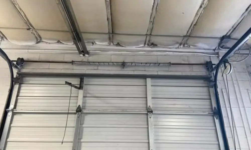 dépannage porte sectionnelle Freneuse