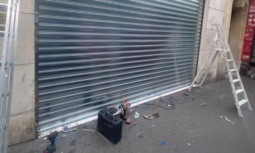 déblocage rideau de commerce à Paris 75013