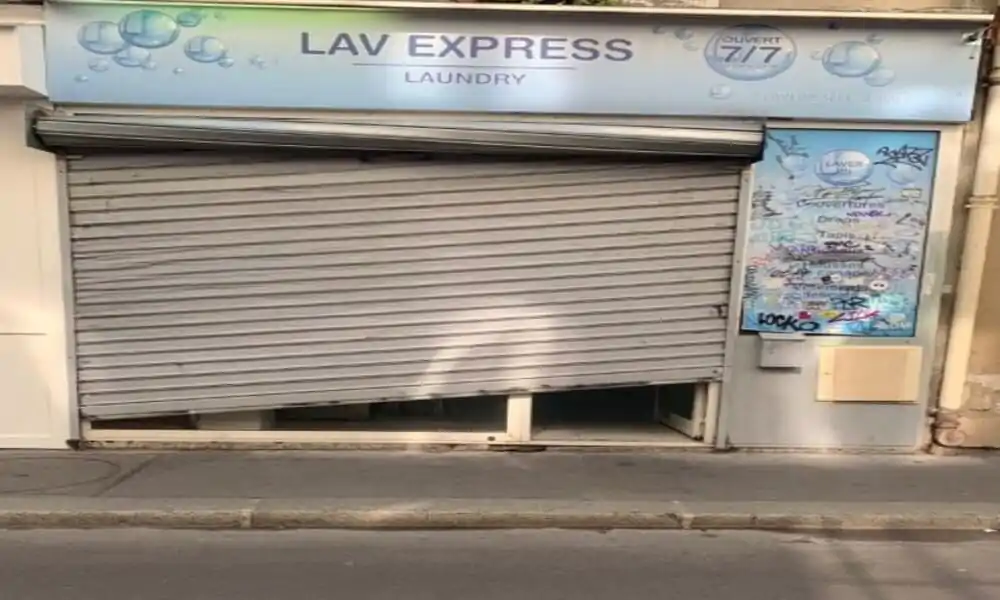Déblocage rideau métallique désaxé Villeparisis