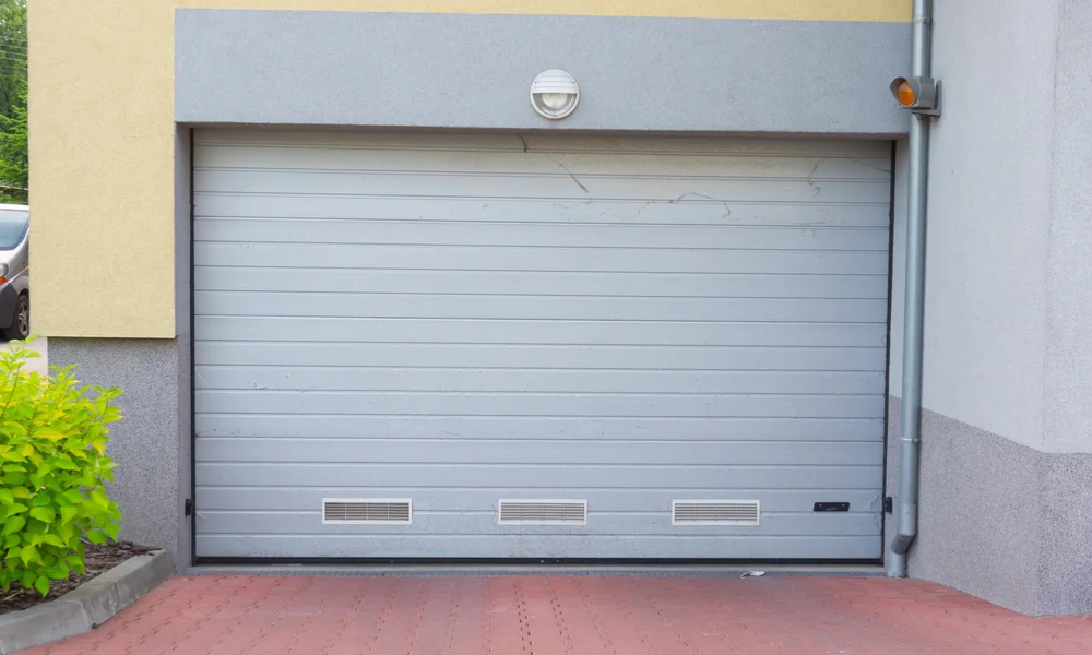 réparation porte de garage Gouzangrez