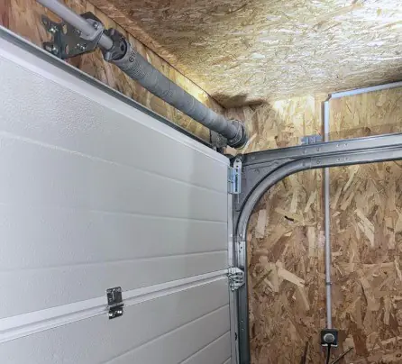 Réparation porte sectionnelle Vincennes