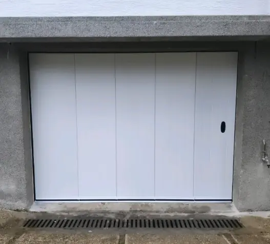 Pose porte de garage coulissante sur mesure