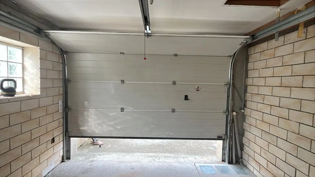 Pose porte de garage sectionnelle sur mesure