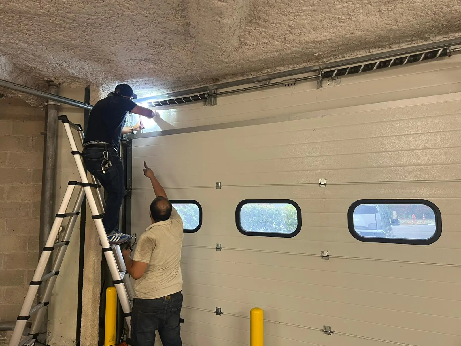 Réparation porte de garage sectionnelle