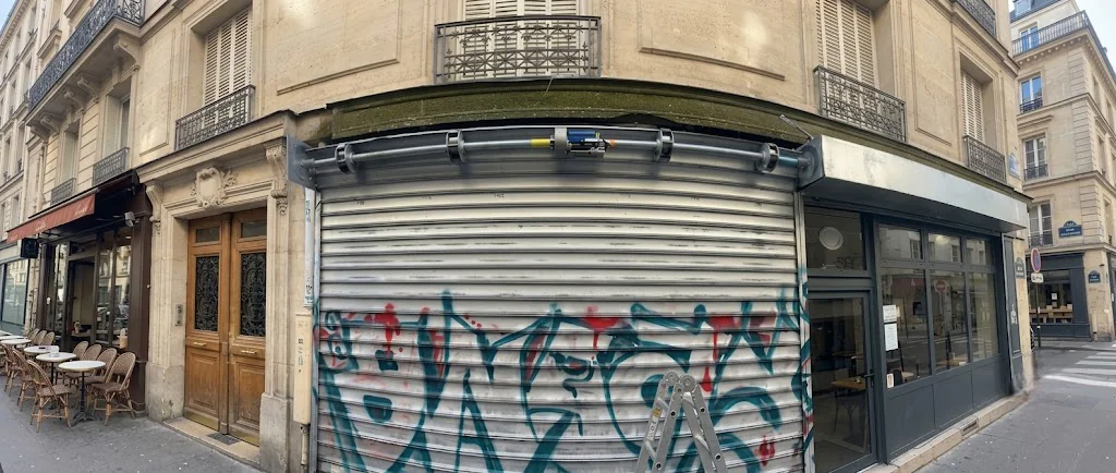 changement ressorts distendus rideau metallique à Issou