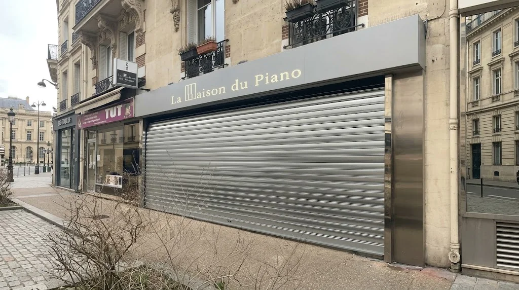 mise à neuf coulisses déformées rideau métallique - Le Perray-en-Yvelines