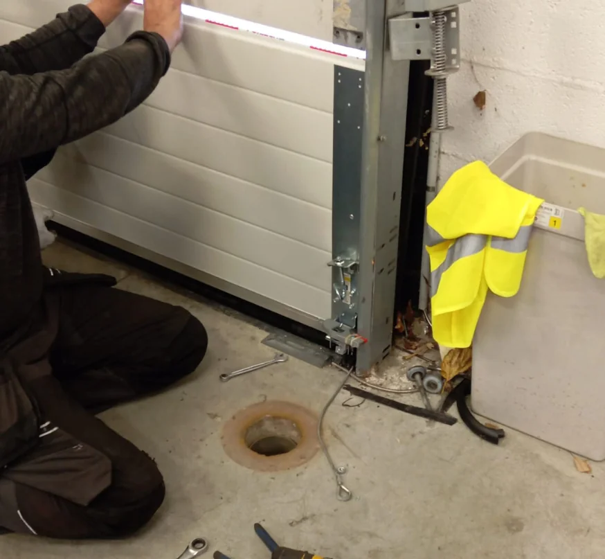Changer un panneau porte de garage sectionnelle 