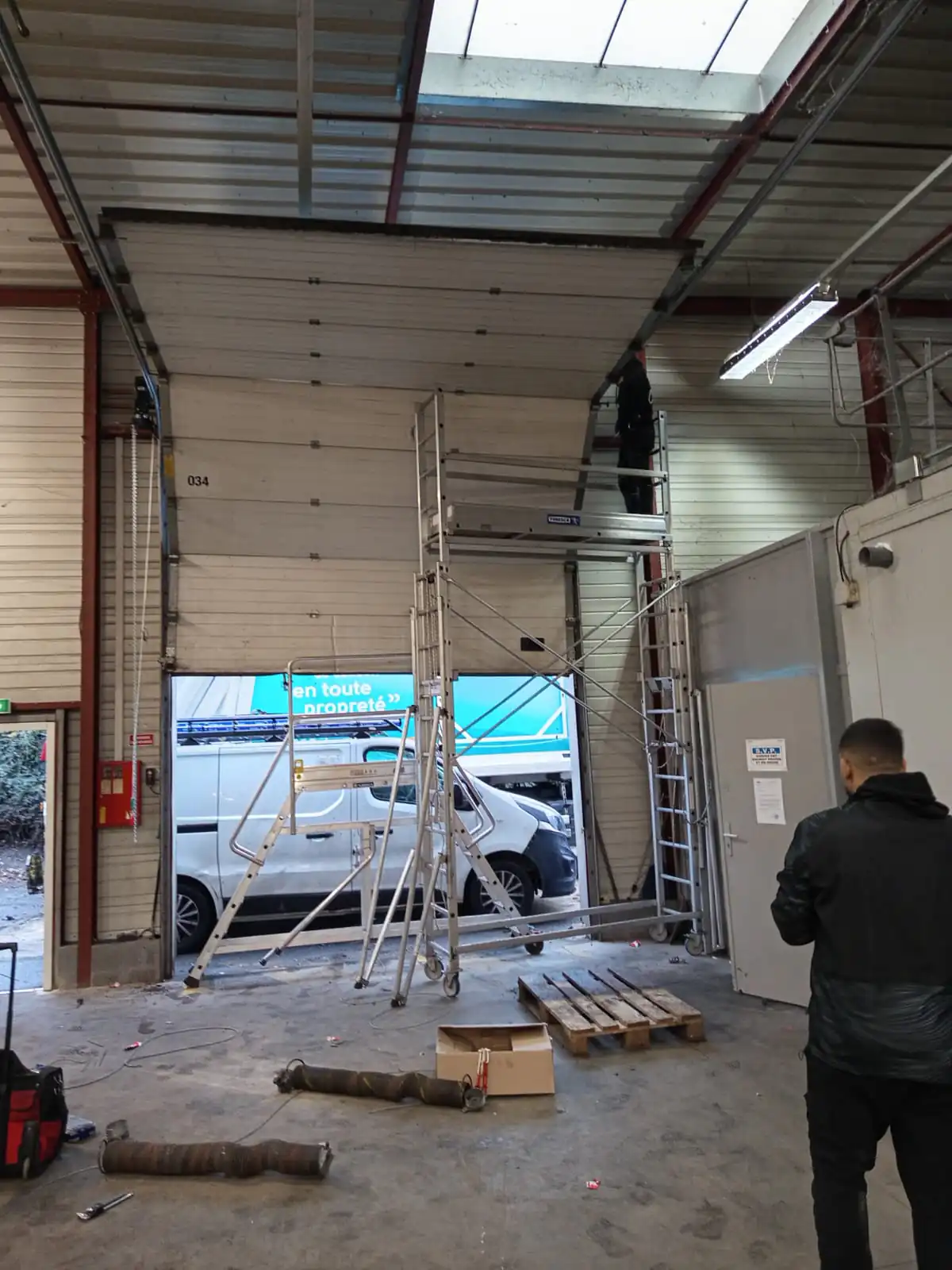 Remplacement tablier porte sectionnelle industrielle à Asnières sur Seine 92600
