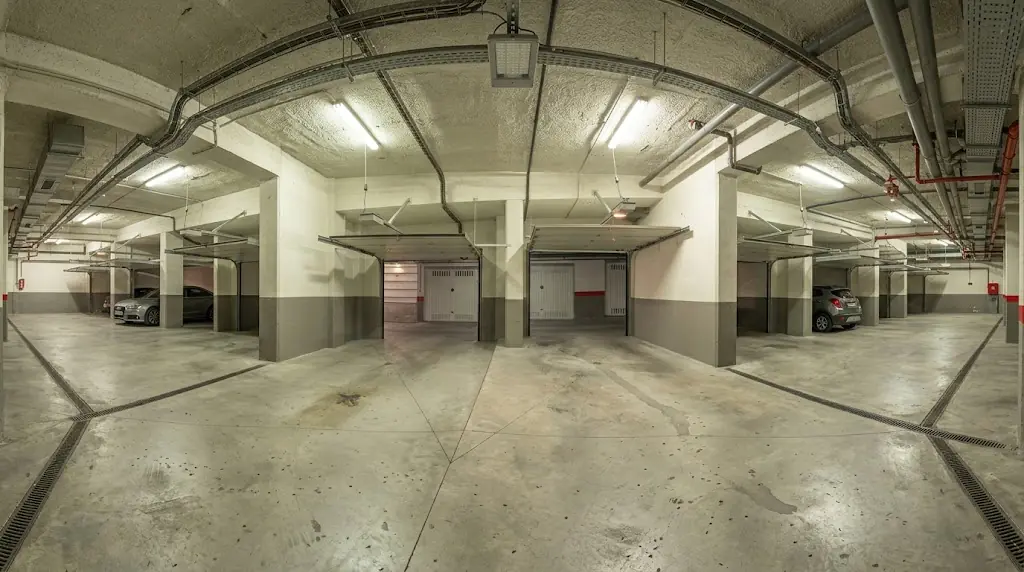 Réparation porte de garage sectionnelle Saint-Forget