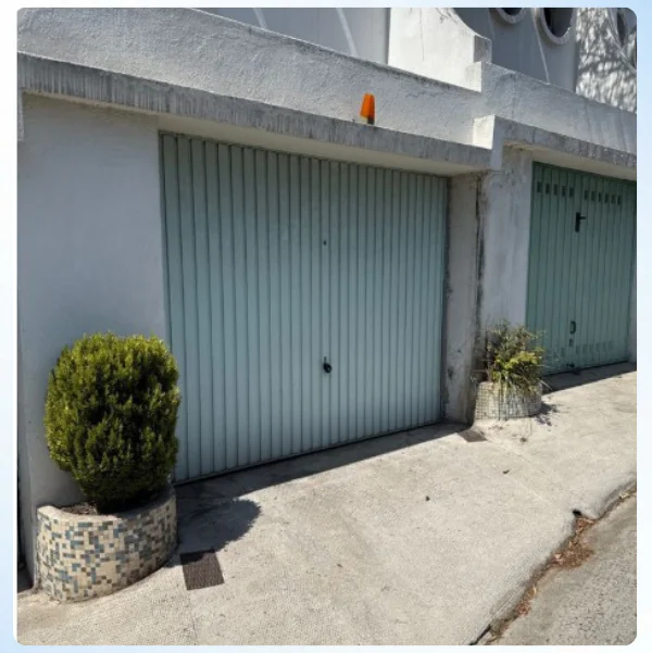 Déblocage porte de garage basculante contrôlé lors d'une réparation à Cheptainville