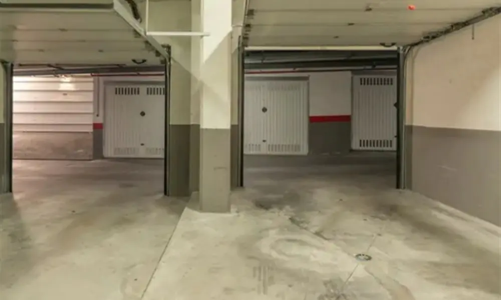 Porte de garage de parking collectif en résidence, remise en état à Villiers-sur-Orge (91700)