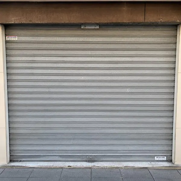 Réparateur de rideau métallique à La Queue-lès-Yvelines, Rue Nationale, 78940 : lames et coulisses contrôlées par MGParis